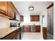 Well-equipped kitchen with sleek countertops, stainless steel appliances, and plenty of storage at 2401 E 35Th Ave, Denver, CO 80205