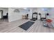 Finished basement featuring exercise equipment at 14120 E Warren Pl, Aurora, CO 80014