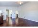 Spacious bedroom featuring hardwood floors and ensuite bathroom at 14120 E Warren Pl, Aurora, CO 80014