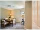 Cozy dining area with carpeted floors and a table with seating for four at 6114 Salvia Ln, Arvada, CO 80403