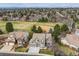 An aerial view shows the home's location in a residential area with a large green field at 11930 E Lake Cir, Greenwood Village, CO 80111