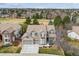 Beautiful exterior elevation, showcasing meticulous landscaping and a welcoming entrance at 11930 E Lake Cir, Greenwood Village, CO 80111