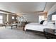 Large main bedroom suite with tray ceiling, sitting area, and plenty of space at 11930 E Lake Cir, Greenwood Village, CO 80111