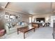 Spacious main bedroom suite with a comfortable sitting area and abundant natural light at 11930 E Lake Cir, Greenwood Village, CO 80111