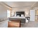 Serene main bedroom with tray ceilings, neutral tones, and plenty of space at 11930 E Lake Cir, Greenwood Village, CO 80111