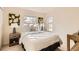 Comfortable bedroom with neutral carpet, bright windows and contemporary decor at 1773 S Union Blvd, Lakewood, CO 80228