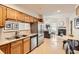 Efficient kitchen with stainless steel appliances and open layout to the living room at 1773 S Union Blvd, Lakewood, CO 80228