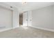 Cozy basement bedroom with neutral carpet, a closet, and fresh paint, ready for customization at 1556 Osceola St, Denver, CO 80204