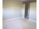 Bright bedroom with neutral carpet with a closet nearby at 5401 S Park Terrace Ave # 204C, Greenwood Village, CO 80111