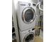 A laundry room featuring an LG brand stackable washer and dryer at 5401 S Park Terrace Ave # 204C, Greenwood Village, CO 80111