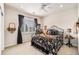 Charming bedroom with an antique bed frame and window seating at 1469 Peninsula Cir, Castle Rock, CO 80104