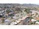 This aerial view shows a community with unique rock formations blended with the surrounding neighborhood, providing a scenic backdrop at 10576 Roxborough Dr, Littleton, CO 80125