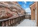 Balcony view overlooking beautiful rock formations and a clear, blue sky at 10576 Roxborough Dr, Littleton, CO 80125