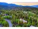 Beautiful mountain community surrounded by trees, mountains and stunning scenery at 120 Windwood Cir, Breckenridge, CO 80424