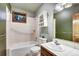 Bathroom featuring a shower-tub combination and a vanity sink with tile countertop at 120 Windwood Cir, Breckenridge, CO 80424