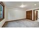 Bedroom featuring carpet floors, natural light and double door closet at 120 Windwood Cir, Breckenridge, CO 80424