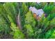 Secluded mountain home surrounded by a lush forest with a private trail at 120 Windwood Cir, Breckenridge, CO 80424