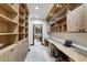 Bright office space with built-in shelves and desk, perfect for working from home at 120 Windwood Cir, Breckenridge, CO 80424