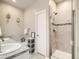 Elegant bathroom with double vanity and large shower at 11250 Florence St # 28E, Commerce City, CO 80640