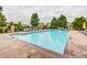 Relaxing community pool with plenty of lounge chairs at 11250 Florence St # 28E, Commerce City, CO 80640