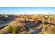 Community playground with walking paths and grassy areas at 1825 Wingfeather Ln, Castle Rock, CO 80108