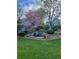 A beautifully landscaped backyard with a patio area perfect for relaxing or entertaining in a tranquil setting at 4349 S Genoa Ct, Centennial, CO 80015