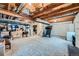 Spacious unfinished basement provides ample storage with exposed ceiling beams at 4349 S Genoa Ct, Centennial, CO 80015