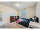 Bedroom with a queen bed and dresser at 1584 S Vaughn Cir, Aurora, CO 80012