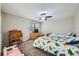 Bedroom with twin bed and built-in desk at 1584 S Vaughn Cir, Aurora, CO 80012