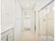 Bathroom with shower, vanity, and access to closet at 8888 Salida St, Commerce City, CO 80022