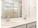 Bathroom with double vanity and a mirrored medicine cabinet at 8888 Salida St, Commerce City, CO 80022