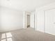 Spacious bedroom with double door closet and carpet at 8888 Salida St, Commerce City, CO 80022