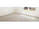 Simple bedroom with new carpet and window at 8888 Salida St, Commerce City, CO 80022