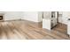 Spacious living room with hardwood floors and fireplace at 8888 Salida St, Commerce City, CO 80022