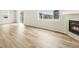 Spacious living room featuring wood-look floors and large windows at 8888 Salida St, Commerce City, CO 80022