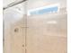 Bright bathroom with a spacious shower and window at 8888 Salida St, Commerce City, CO 80022