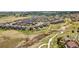 Community aerial view showcases the neighborhood, walking trails, greenbelts, and proximity to Pathfinder Park at 23883 E Minnow Cir, Aurora, CO 80016