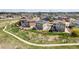 Aerial view of a lovely neighborhood with fenced backyards and sidewalks, offering a sense of community and privacy at 23883 E Minnow Cir, Aurora, CO 80016