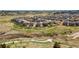 A peaceful neighborhood aerial view features easy access to community parks and walking trails, making it ideal for outdoor activities at 23883 E Minnow Cir, Aurora, CO 80016