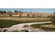 Paved trail with cyclists enjoying the scenic views of grassy hills and trees at 23883 E Minnow Cir, Aurora, CO 80016