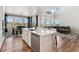 Spacious kitchen island with stainless steel dishwasher, great views and modern finishes at 23883 E Minnow Cir, Aurora, CO 80016