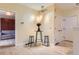 Eat-in kitchen area featuring a bistro table, seating, and modern light fixture at 3040 W Prentice Ave # B, Littleton, CO 80123