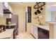 Well-equipped kitchen featuring stainless steel appliances and light countertops at 3040 W Prentice Ave # B, Littleton, CO 80123