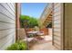 Quaint patio with seating area and surrounding greenery at 3040 W Prentice Ave # B, Littleton, CO 80123