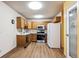 Kitchen featuring updated stainless steel appliances at 13500 E Cornell Ave # 302, Aurora, CO 80014