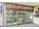 Relaxing patio with a view of mature trees and green space at 13500 E Cornell Ave # 302, Aurora, CO 80014