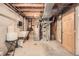 Exposed basement with essential utilities, displaying the home's mechanical systems at 13934 W Warren Dr, Lakewood, CO 80228