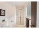 Bright bathroom featuring a shower, vanity, and neutral finishes at 13934 W Warren Dr, Lakewood, CO 80228