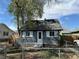 Charming home featuring a fenced yard and welcoming front porch, perfect for enjoying the outdoors at 253 7Th St, Frederick, CO 80530