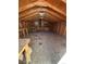 Interior of shed features wood walls, ceiling, with work benches, windows, and cabinets at 253 7Th St, Frederick, CO 80530